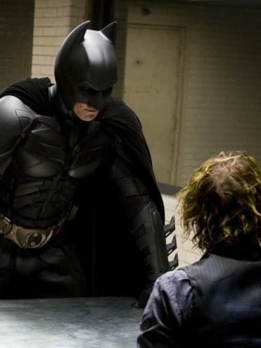 Batman interrogating Joker for a meme thumbnail