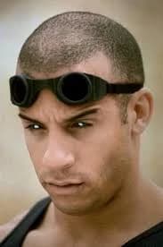 (Riddick's eyes, which had been closed, slowly open, gleaming with a dangerous, icy glint) thumbnail