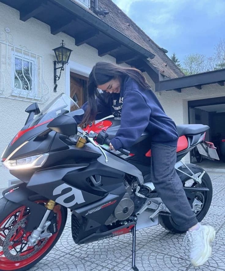 She loves her motorcycle more than she loves you thumbnail