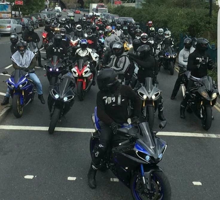 Isaac and his biker group thumbnail