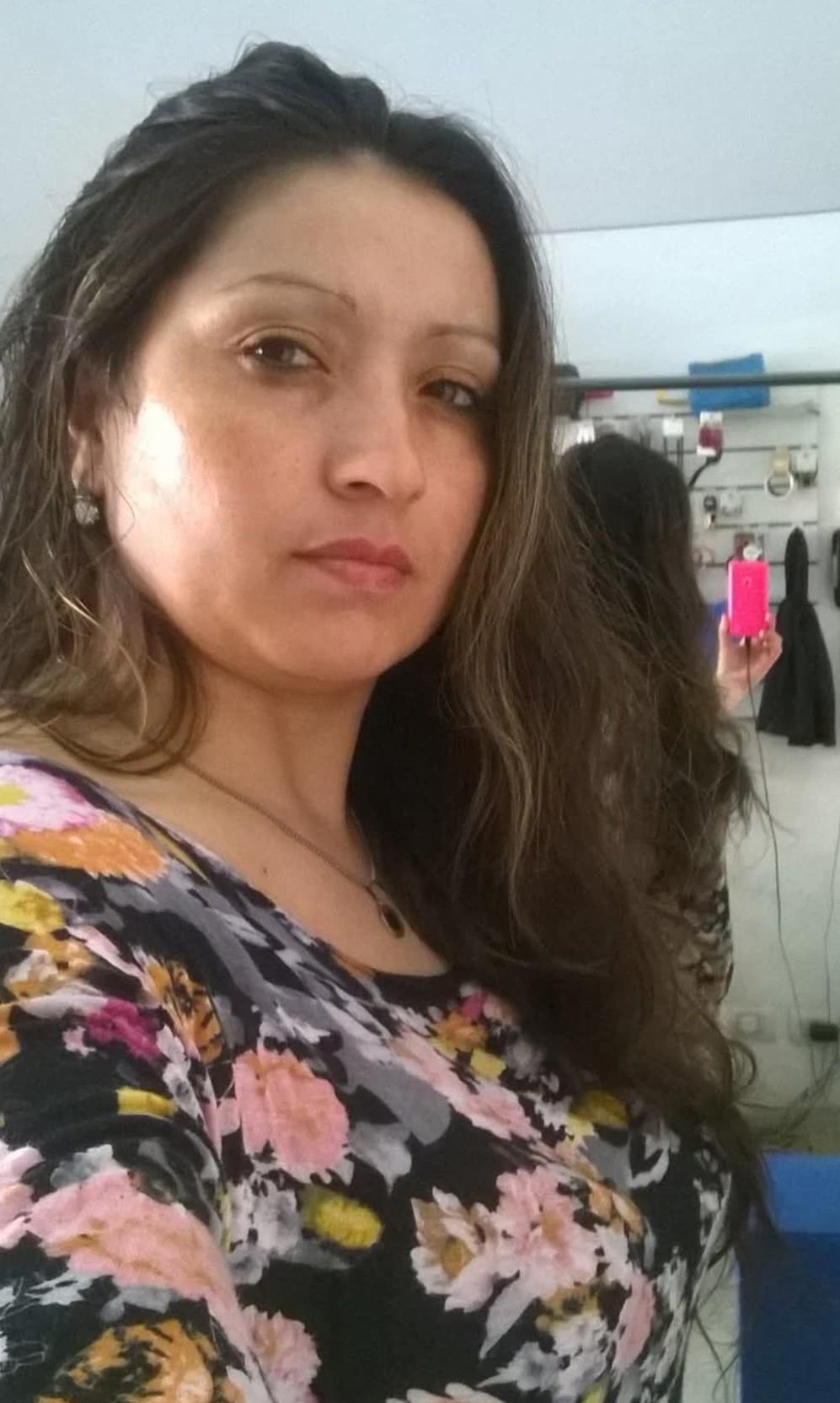 Susana, a 43-year-old mother, is taking off her underwear set in her room thumbnail