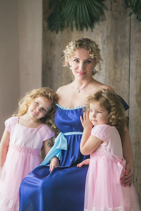 Mother and twin daughters  thumbnail
