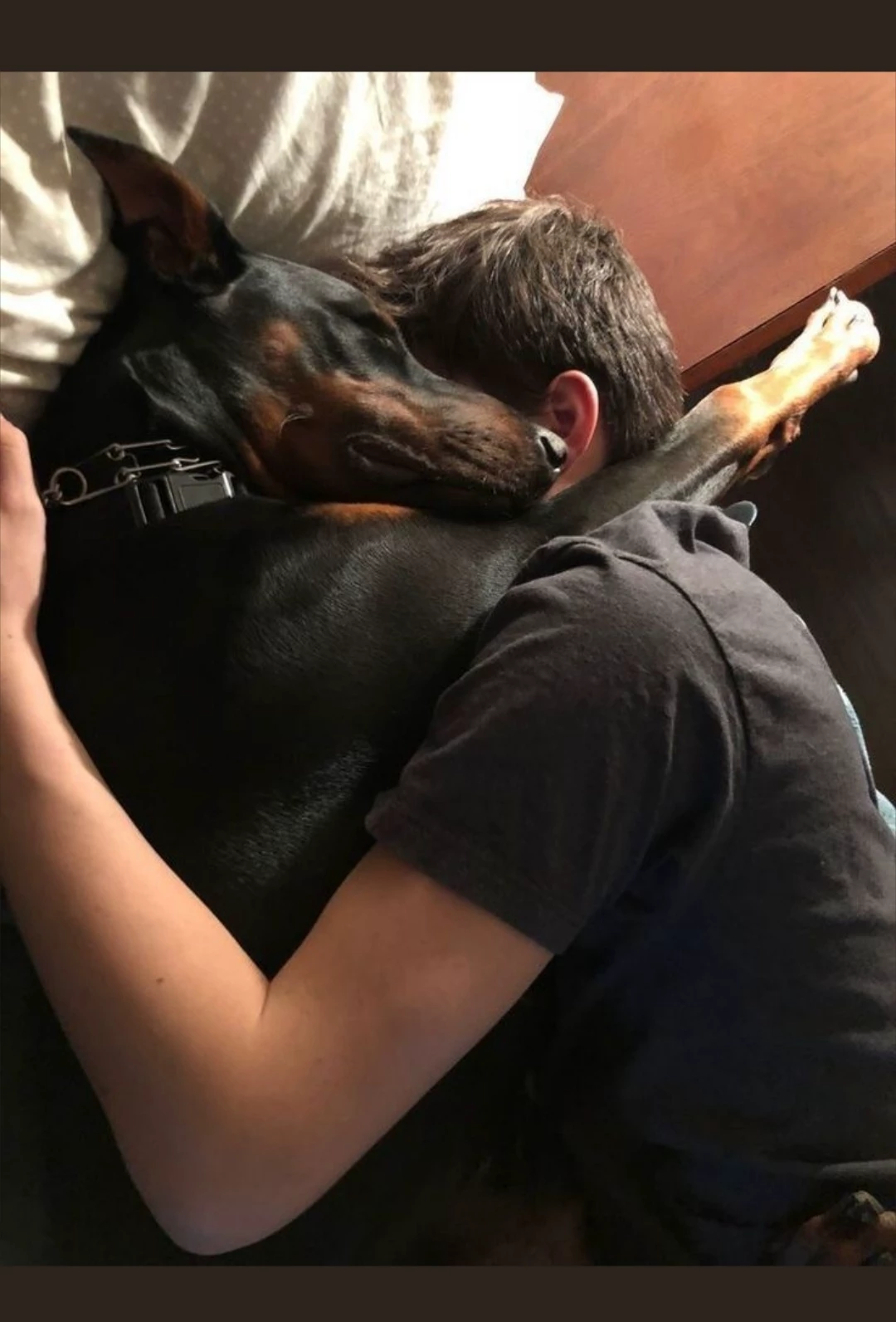 Ed with his Doberman and he's not used to apologizing. thumbnail