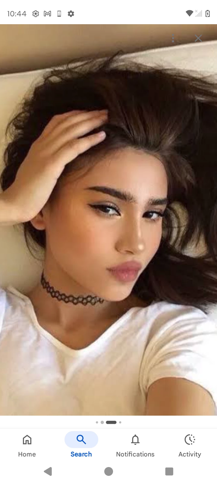 her thumbnail