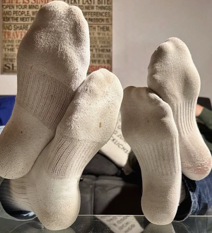 2 pairs of male feet thumbnail