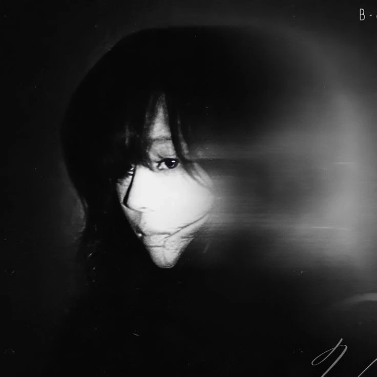 M.